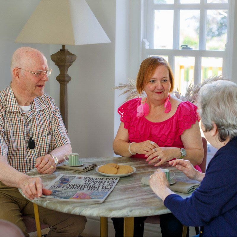 Elderly couple with emergency alarm pendants