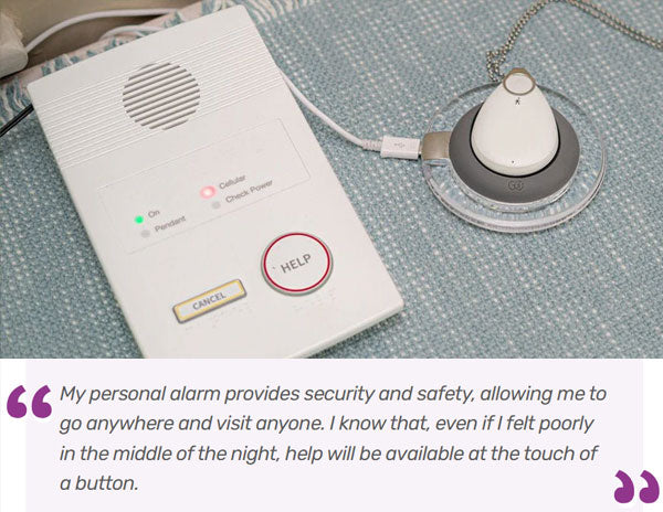 Personal alarm device with a pendant on a textured surface, featuring a quote about security and safety.