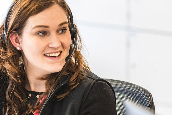 Person wearing a headset in an office setting