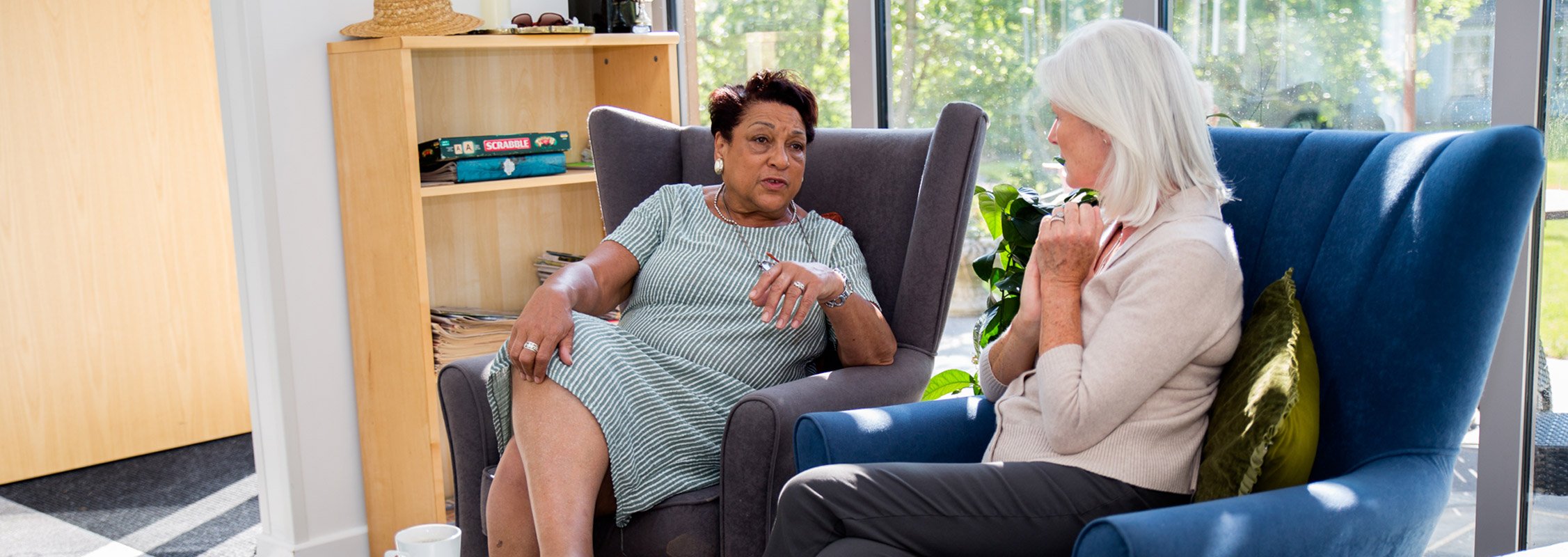 Elderly lady and friend talking