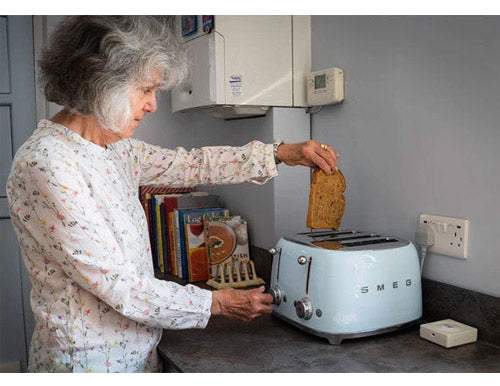 Lady making a meal in the kitchen