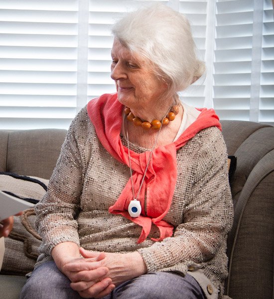 Elderly lady with call alarm