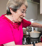 Elderly lady with care alarm