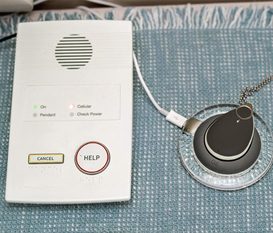 Alarm base unit and pendant