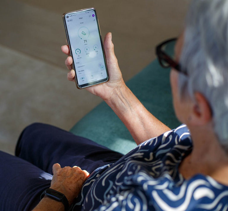 Person using a smartphone app on a blurred background