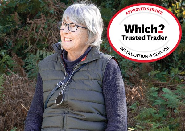 Elderly person wearing GPS tracker pendant