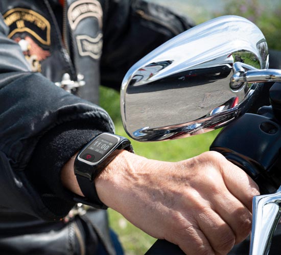 Motorcyclist wearing GPS alarm